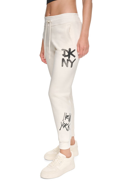 MID-RISE GRAFFITI RHINESTONE LOGO JOGGER Eggnog | DKNY