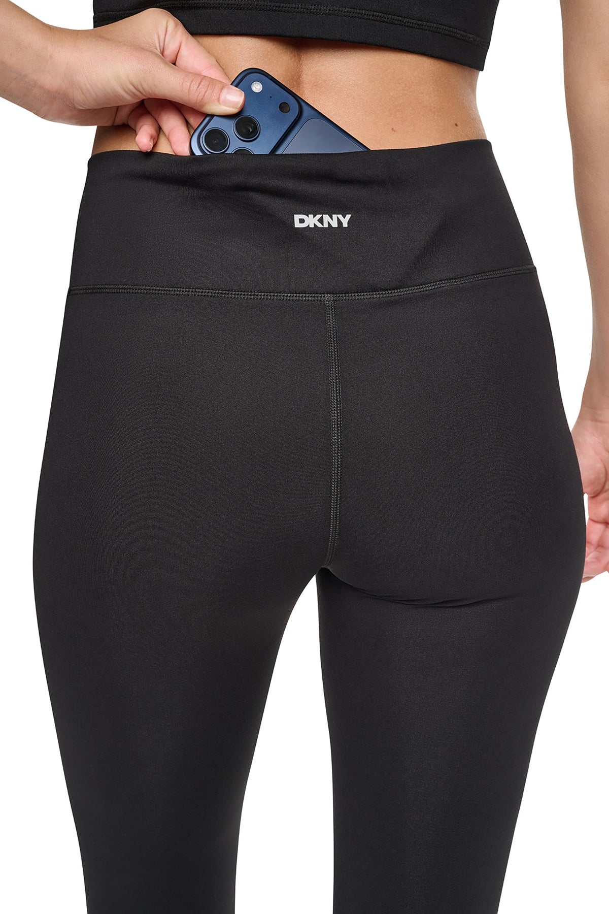 BALANCE COMPRESSION CROSSOVER FRONT FLARE PANT Black | DKNY