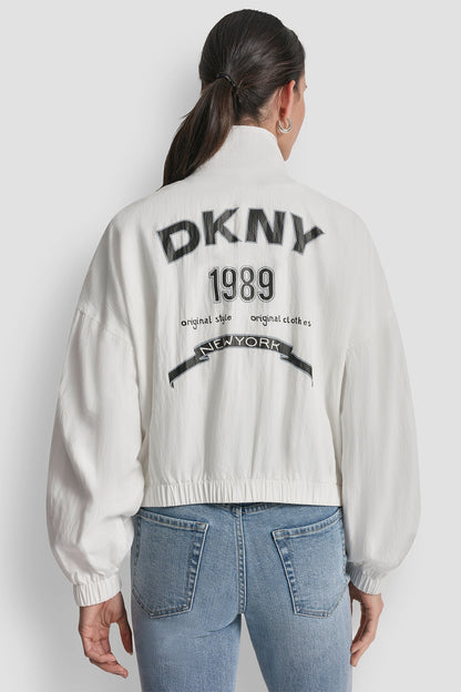 1989 LOGO TRENCH JACKET Ivory | DKNY