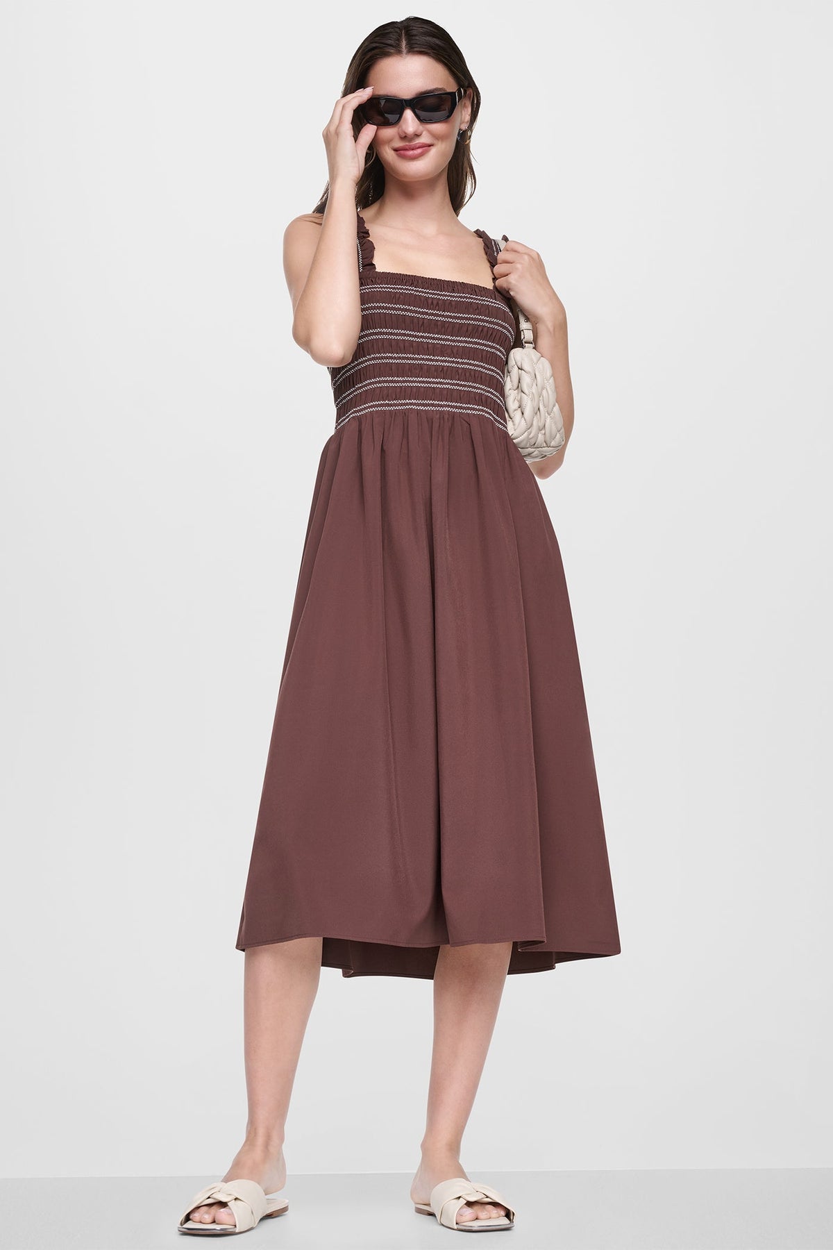 SLEEVELESS SMOCKED MIDI A-LINE DRESS Black | DKNY