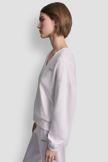 METALLIC BUBBLE LOGO V-NECK PULLOVER White | DKNY